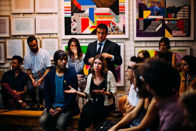 group of people gathered together having a discussion